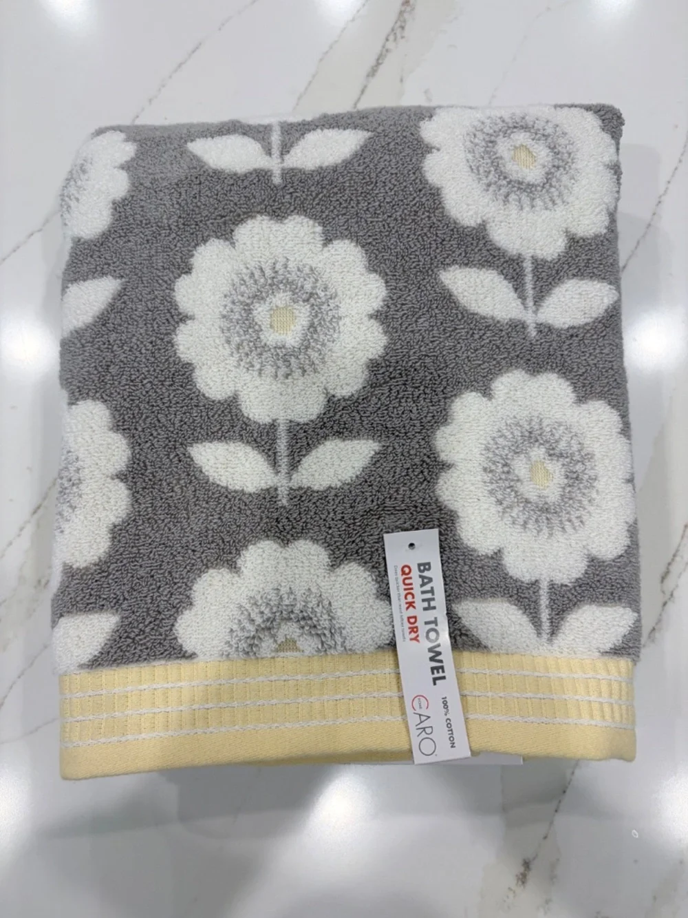 2 NWT Caro Bath Towels gray, yellow and white floral pattern